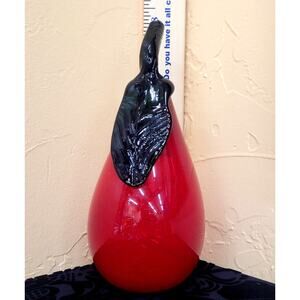 A Hand Blown Red Pear with Green Stem. This is 8 1/4" Tall